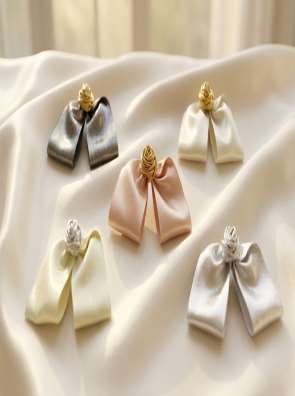 Satin bow clips with gold knot